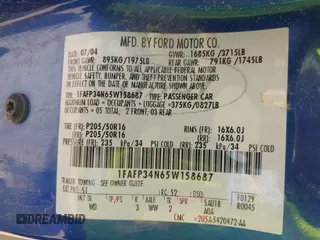 2005 Ford Focus S with VIN 1FAFP34N65W158687, listed as a IAAI auction lot 42706418 with Not provided miles and . Bid and sale history available at DreamBid. Image 9.