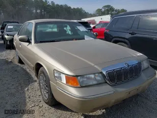 1999 Mercury Grand Marquis GS with VIN 2MEFM74W0XX652651, listed as a IAAI auction lot 41773581 with 285,921 mi miles. Bid and sale history available at carsss.com. Image 1.