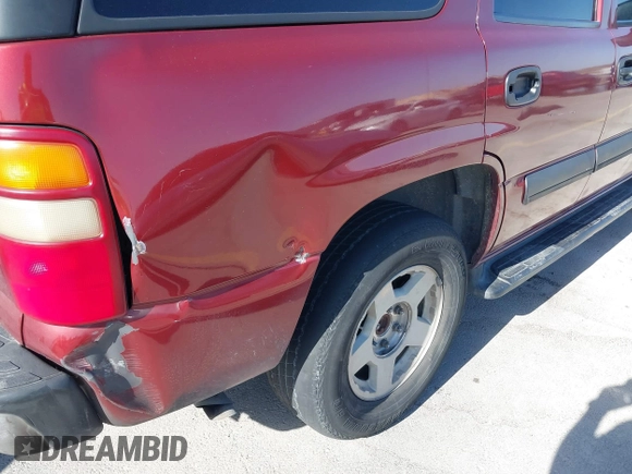 2003 Chevrolet Tahoe LS z VIN 1GNEK13Z73R127111, wystawiony jako IAAI lot #41830248 z przebiegiem Nie podano mil oraz . Historia ofert i sprzedaży dostępna na DreamBid. Obrazek 12.