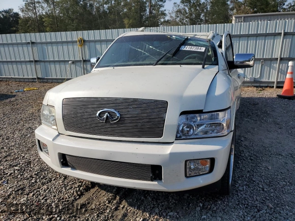2006 Infiniti QX56 z VIN 5N3AA08A76N810044, wystawiony jako Copart lot #74182384 z przebiegiem Nie podano mil oraz Szkoda całkowita • Salvage title. Historia ofert i sprzedaży dostępna na DreamBid. Obrazek 5.