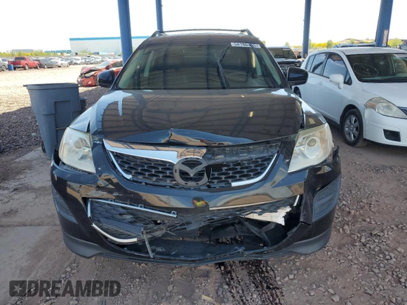 2012 Mazda CX-9 Touring z VIN JM3TB2CA2C0365072, wystawiony jako Copart lot #54186355 z przebiegiem 131 448 mil mil oraz Szkoda całkowita • Salvage title. Historia ofert i sprzedaży dostępna na DreamBid. Obrazek 5.