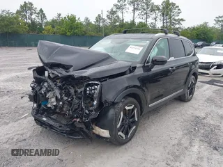 2023 Kia Telluride EX with VIN 5XYP34GC9PG339972, listed as a IAAI auction lot 42212326 with 41,083 mi miles and . Bid and sale history available at DreamBid. Image 2.