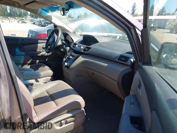 2012 Honda Odyssey EX-L with VIN 5FNRL5H64CB127523, listed as a IAAI auction lot 39818448 with 102,514 mi miles and . Bid and sale history available at DreamBid. Image 5.