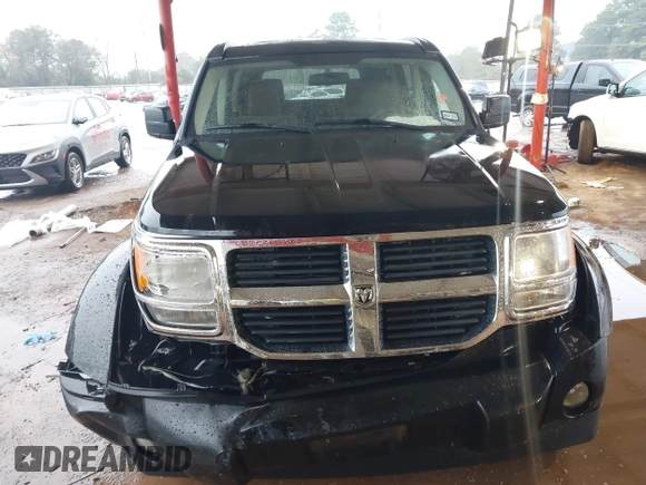 2007 Dodge Nitro SXT with VIN 1D8GT28K67W683600, listed as a IAAI auction lot 40958011 with 70,141 mi miles. Bid and sale history available at carsss.com. Image 12.