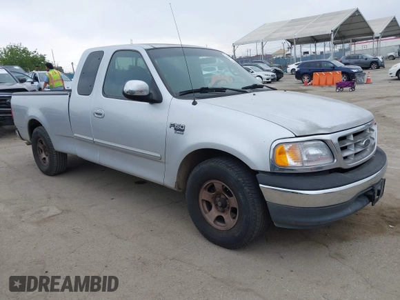2000 Ford F-150 XL with VIN 1FTRX17W0YKA70861, listed as a IAAI auction lot 42096438 with 1 mi miles. Bid and sale history available at carsss.com. Image 1.