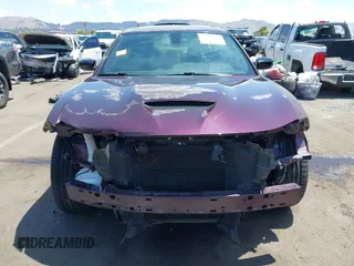2021 Dodge Charger R/T with VIN 2C3CDXCT2MH574377, listed as a IAAI auction lot 42760667 with 49,295 mi miles and . Bid and sale history available at DreamBid. Image 13.