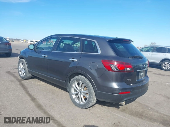 2013 Mazda CX-9 Grand Touring with VIN JM3TB3DA0D0412833, listed as a IAAI auction lot 41876447 with 173,830 mi miles and . Bid and sale history available at carsss.com. Image 3.