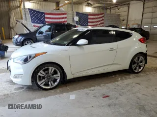 2013 Hyundai Veloster w/Red Int with VIN KMHTC6AD2DU110048, listed as a Copart auction lot 54928655 with 84,758 mi miles and Salvage title. Bid and sale history available at DreamBid. Image 1.