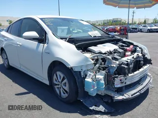 2018 Toyota Prius Two z VIN JTDKARFUXJ3055253, wystawiony jako IAAI lot #42298455 z przebiegiem 222 650 mil mil oraz . Historia ofert i sprzedaży dostępna na DreamBid. Obrazek 1.