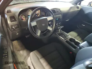 2009 Dodge Challenger R/T z VIN 2B3LJ54T09H593106, wystawiony jako Copart lot #58562535 z przebiegiem 134 380 mil mil oraz Szkoda całkowita • Salvage title. Historia ofert i sprzedaży dostępna na DreamBid. Obrazek 8.
