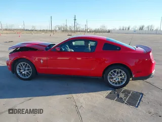 2012 Ford Mustang V6 Premium with VIN 1ZVBP8AM5C5262332, listed as a IAAI auction lot 41243050 with 105,157 mi miles. Bid and sale history available at carsss.com. Image 14.
