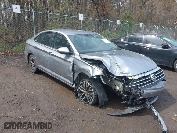 2021 Volkswagen Jetta S z VIN 3VWC57BUXMM048600, wystawiony jako IAAI lot #41956222 z przebiegiem 59 870 mil mil oraz . Historia ofert i sprzedaży dostępna na DreamBid. Obrazek 1.