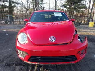 2019 Volkswagen Beetle S with VIN 3VWFD7AT1KM712384, listed as a IAAI auction lot 41505127 with 49,527 mi miles and . Bid and sale history available at DreamBid. Image 12.
