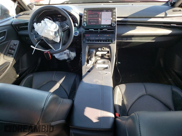 2021 Toyota Avalon Hybrid XSE z VIN 4T1EA1AB5MU007884, wystawiony jako Copart lot #76042404 z przebiegiem 188 347 mil mil oraz Szkoda całkowita • Salvage title. Historia ofert i sprzedaży dostępna na DreamBid. Obrazek 8.