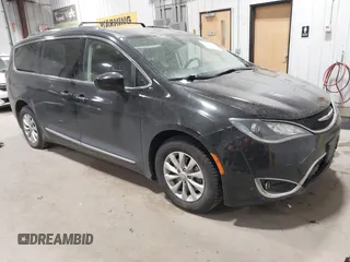 2020 Chrysler Pacifica Touring L with VIN 2C4RC1BG3LR176355, listed as a IAAI auction lot 42403770 with 134,909 mi miles and . Bid and sale history available at DreamBid. Image 1.