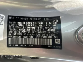 2019 Honda Clarity z VIN JHMZC5F14KC002619, wystawiony jako Copart lot #58252705 z przebiegiem 53 911 mil mil oraz Szkoda całkowita • Salvage title. Historia ofert i sprzedaży dostępna na DreamBid. Obrazek 10.