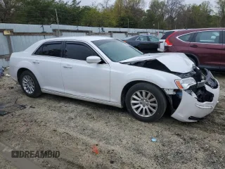 2014 Chrysler 300 with VIN 2C3CCAAG9EH305803, listed as a Copart auction lot 52759535 with 148,689 mi miles and Salvage Title. Bid and sale history available at DreamBid. Image 4.