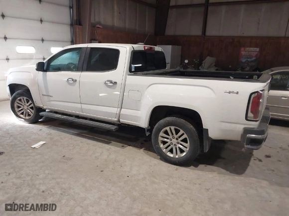 2016 GMC Canyon 4WD SLT with VIN 1GTG6DE31G1284833, listed as a IAAI auction lot 41421843 with 112,593 mi miles. Bid and sale history available at carsss.com. Image 3.