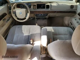 2007 Mercury Grand Marquis GS with VIN 2MEFM74V57X603310, listed as a Copart auction lot 70229064 with 119,536 mi miles and Salvage Title. Bid and sale history available at carsss.com. Image 8.