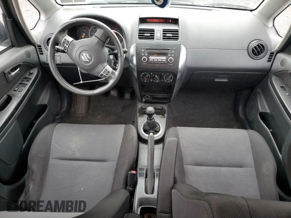 2009 Suzuki SX4 Man FWD with VIN JS2YC412396201554, listed as a Copart auction lot 72902194 with 135,355 mi miles and Salvage Title. Bid and sale history available at carsss.com. Image 8.