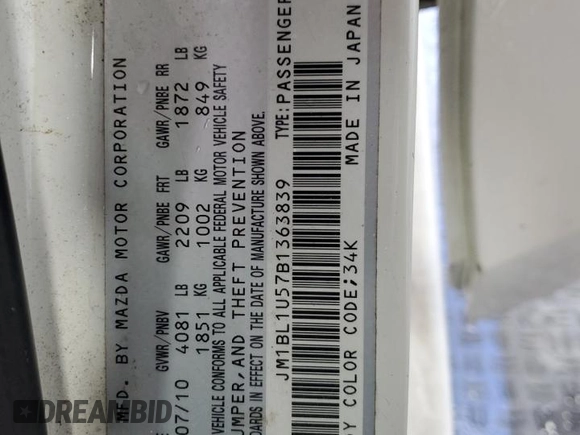 2011 Mazda 3 S Sport z VIN JM1BL1U57B1363839, wystawiony jako Copart lot #56276045 z przebiegiem 255 260 mil mil oraz Szkoda całkowita • Salvage title. Historia ofert i sprzedaży dostępna na DreamBid. Obrazek 12.