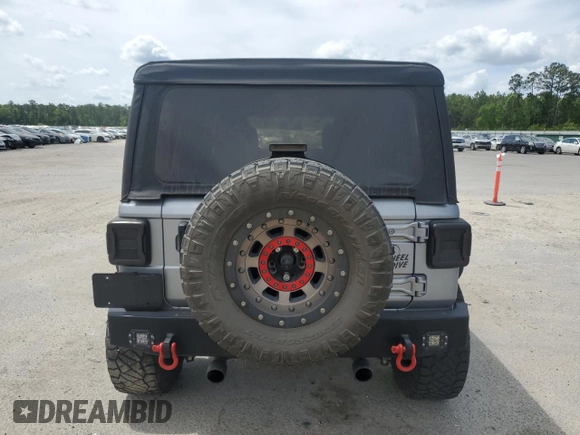 2020 Jeep Wrangler Unlimited Willys z VIN 1C4HJXDG5LW216718, wystawiony jako Copart lot #53144705 z przebiegiem 27 932 mil mil oraz Czysty tytuł • Clean title. Historia ofert i sprzedaży dostępna na DreamBid. Obrazek 6.