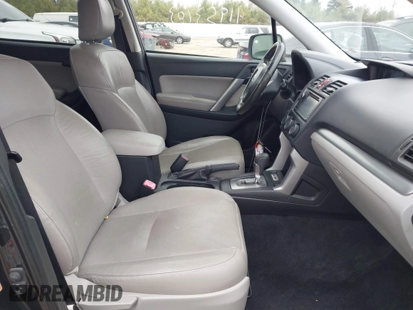 2014 Subaru Forester 2.5i Limited with VIN JF2SJAJC1EH517094, listed as a IAAI auction lot 41953103 with 145,122 mi miles. Bid and sale history available at carsss.com. Image 5.