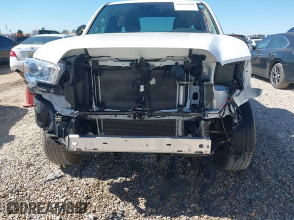 2022 Toyota Tacoma SR with VIN 3TYRX5GN5NT055120, listed as a IAAI auction lot 41687849 with 18,751 mi miles and . Bid and sale history available at DreamBid. Image 6.