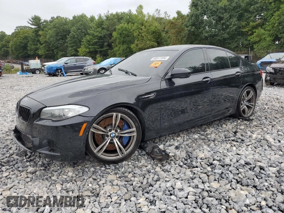 2013 BMW M5 with VIN WBSFV9C53DD096852, listed as a Copart auction lot 65917404 with 0 mi miles and Salvage Title. Bid and sale history available at carsss.com. Image 1.