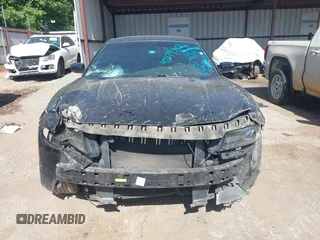2015 Dodge Charger SXT with VIN 2C3CDXHG5FH928553, listed as a IAAI auction lot 42279342 with 129,402 mi miles and . Bid and sale history available at DreamBid. Image 13.
