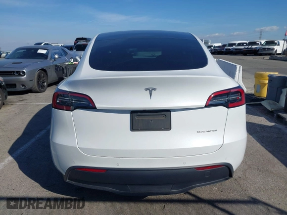 2022 Tesla Model Y Long Range z VIN 7SAYGDEE8NF374636, wystawiony jako IAAI lot #41545669 z przebiegiem 41 965 mil mil oraz . Historia ofert i sprzedaży dostępna na DreamBid. Obrazek 16.
