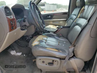 2002 GMC Envoy SLT z VIN 1GKDS13S922263923, wystawiony jako Copart lot #59234395 z przebiegiem Nie podano mil oraz Szkoda całkowita • Salvage title. Historia ofert i sprzedaży dostępna na DreamBid. Obrazek 7.