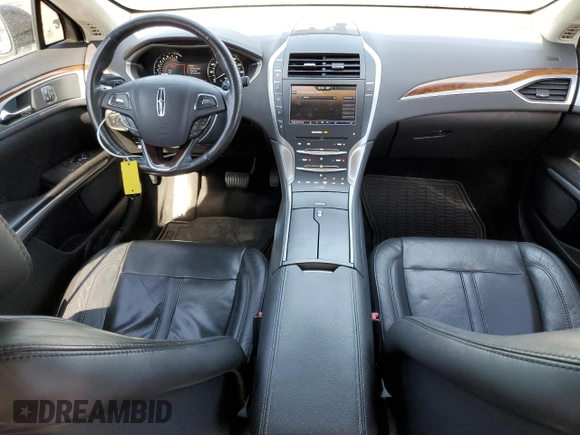 2014 Lincoln MKZ z VIN 3LN6L2GK0ER800286, wystawiony jako Copart lot #57644645 z przebiegiem 130 880 mil mil oraz Szkoda całkowita • Salvage title. Historia ofert i sprzedaży dostępna na DreamBid. Obrazek 8.