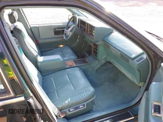 1986 Cadillac Seville z VIN 1G6KS6988GU804079, wystawiony jako IAAI lot #41757149 z przebiegiem 48 807 mil mil oraz . Historia ofert i sprzedaży dostępna na DreamBid. Obrazek 5.