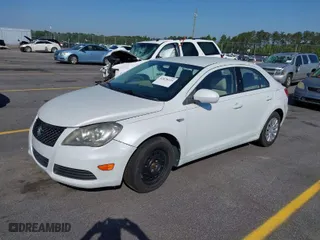 2012 Suzuki Kizashi S with VIN JS2RF9A12C6100223, listed as a IAAI auction lot 42028125 with 114,280 mi miles. Bid and sale history available at carsss.com. Image 2.