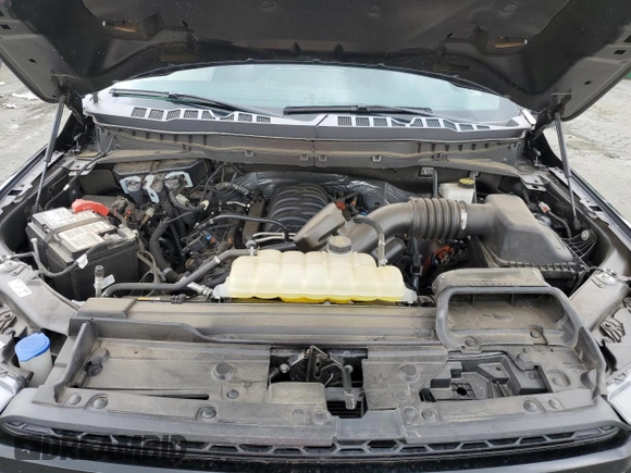 2023 Ford F-150 XL z VIN 1FTFW1E52PFC97105, wystawiony jako Copart lot #62115825 z przebiegiem 27 400 mil mil oraz Szkoda całkowita • Salvage title. Historia ofert i sprzedaży dostępna na DreamBid. Obrazek 11.