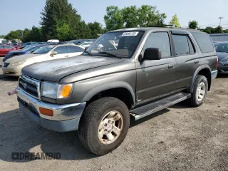 1997 Toyota 4Runner SR5 z VIN JT3HN86R6V0102407, wystawiony jako Copart lot #60698135 z przebiegiem 242 216 mil mil oraz Czysty tytuł • Clean title. Historia ofert i sprzedaży dostępna na DreamBid. Obrazek 1.