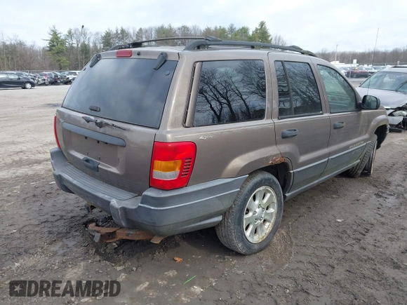 2001 Jeep Grand Cherokee Laredo with VIN 1J4GW48SX1C658610, listed as a IAAI auction lot 41831013 with 200,142 mi miles and . Bid and sale history available at DreamBid. Image 4.