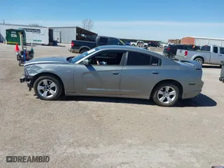 2014 Dodge Charger SE with VIN 2C3CDXBG1EH168709, listed as a IAAI auction lot 41872541 with 137,877 mi miles. Bid and sale history available at carsss.com. Image 15.