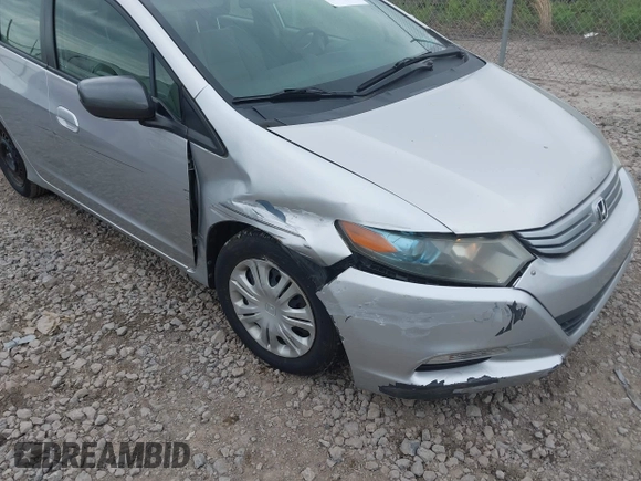 2010 Honda Insight LX with VIN JHMZE2H57AS008203, listed as a IAAI auction lot 42240869 with 150,562 mi miles and . Bid and sale history available at DreamBid. Image 6.