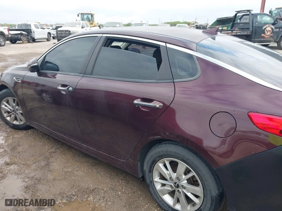 2016 Kia Optima LX with VIN 5XXGT4L3XGG027430, listed as a IAAI auction lot 41940146 with 75,456 mi miles. Bid and sale history available at carsss.com. Image 14.