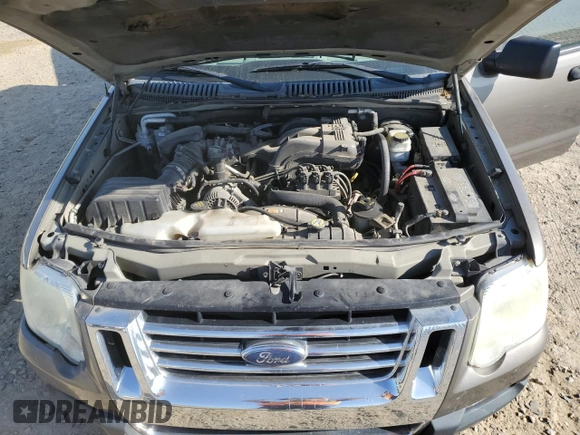 2007 Ford Explorer Sport Trac XLT z VIN 1FMEU31K77UA13757, wystawiony jako Copart lot #53308795 z przebiegiem 205 761 mil mil oraz Czysty tytuł • Clean title. Historia ofert i sprzedaży dostępna na DreamBid. Obrazek 14.