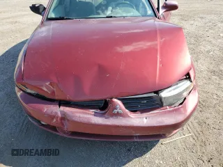 2002 Mitsubishi Galant ES z VIN 4A3AA46G02E153719, wystawiony jako Copart lot #65781504 z przebiegiem 341 516 mil mil oraz Szkoda całkowita • Salvage title. Historia ofert i sprzedaży dostępna na DreamBid. Obrazek 13.