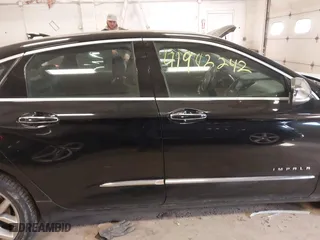 2015 Chevrolet Impala LTZ with VIN 2G1165S38F9145916, listed as a IAAI auction lot 41982242 with 303,316 mi miles. Bid and sale history available at carsss.com. Image 13.
