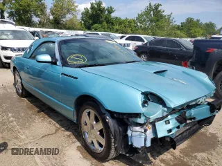 2002 Ford Thunderbird w/Hardtop Premium with VIN 1FAHP60A82Y125798, listed as a Copart auction lot 64193474 with 28,895 mi miles and Salvage Title. Bid and sale history available at carsss.com. Image 4.