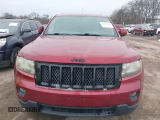 2013 Jeep Grand Cherokee Laredo with VIN 1C4RJEAG4DC573971, listed as a IAAI auction lot 41627288 with 143,256 mi miles. Bid and sale history available at carsss.com. Image 6.