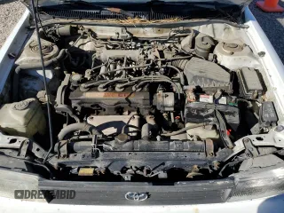 1992 Toyota Corolla z VIN JT2AE94A1N0300157, wystawiony jako Copart lot #77783474 z przebiegiem 180 103 mil mil oraz Czysty tytuł • Clean title. Historia ofert i sprzedaży dostępna na DreamBid. Obrazek 11.
