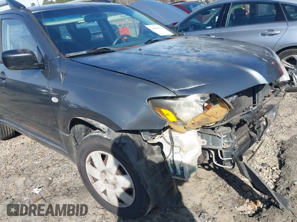 2004 Mitsubishi Outlander LS with VIN JA4LX31F344003223, listed as a IAAI auction lot 41614338 with 135,101 mi miles. Bid and sale history available at carsss.com. Image 6.