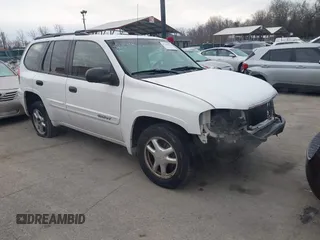 2005 GMC Envoy SLT with VIN 1GKDT13S952190876, listed as a IAAI auction lot 41308686 with 244,774 mi miles. Bid and sale history available at carsss.com. Image 1.