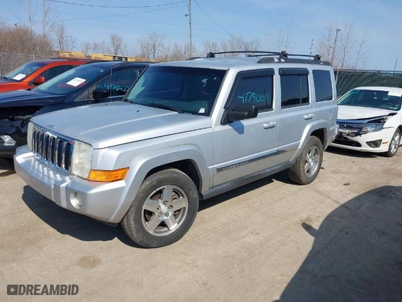 2010 Jeep Commander Sport with VIN 1J4RG4GK2AC105232, listed as a IAAI auction lot 41790011 with 192,281 mi miles. Bid and sale history available at carsss.com. Image 2.